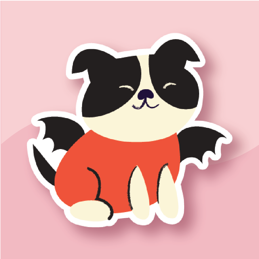 A black-and-white pup wearing bat wings